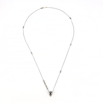 Smooth White Skull Necklace With Black Stones