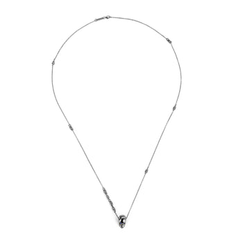 Smooth Black Skull Necklace With Blue Stones