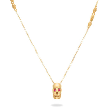 Smooth Yellow Skull Necklace With Red Stones