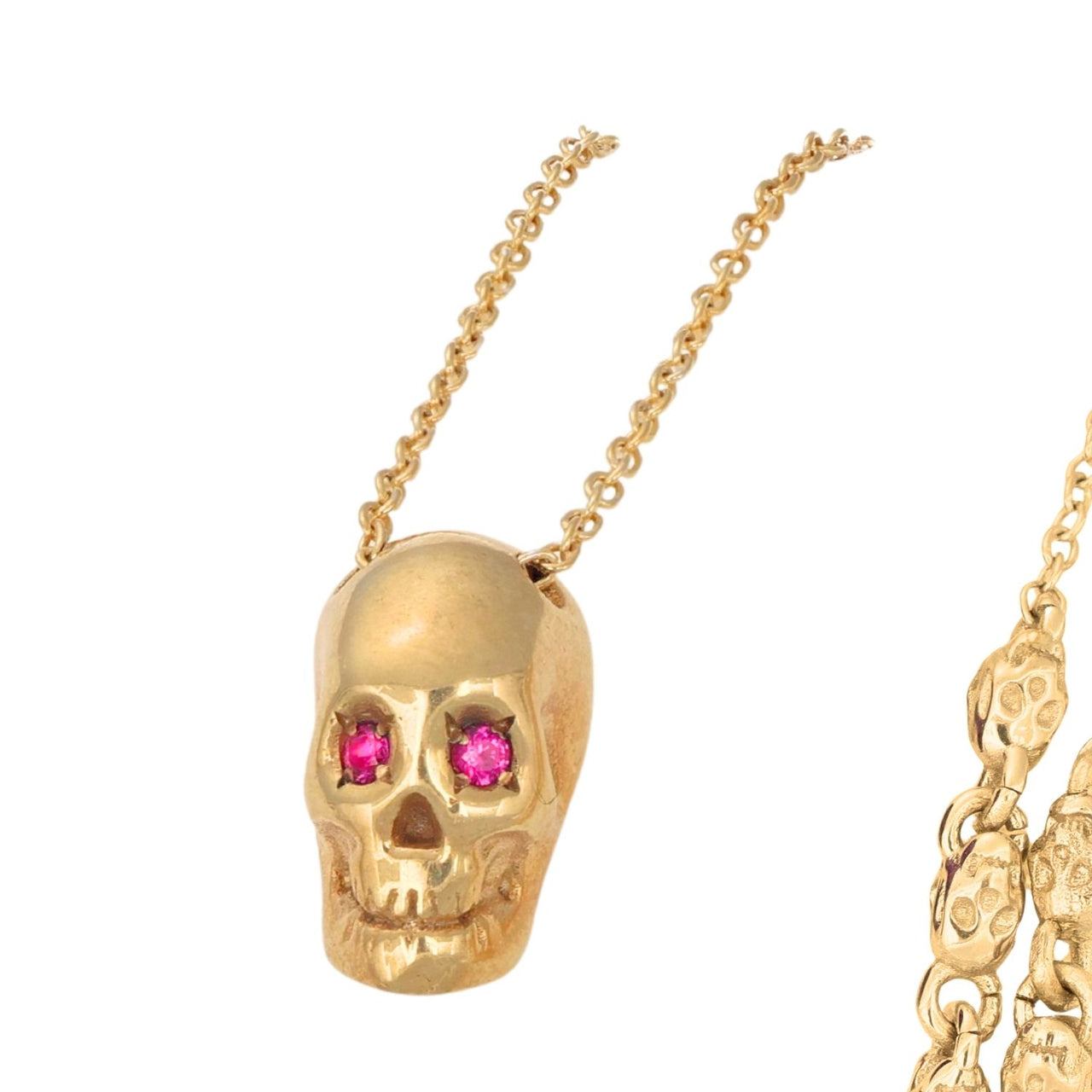 Smooth Yellow Skull Necklace With Red Stones