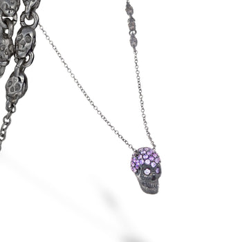 Black Pavé Skull Necklace With Violet Stones