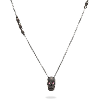 Smooth Black Skull Necklace With Pink Stones