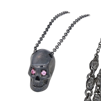 Smooth Black Skull Necklace With Pink Stones